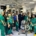 ossigenazione extracorporea, a group of people in scrubs and scrubs posing for a photo
