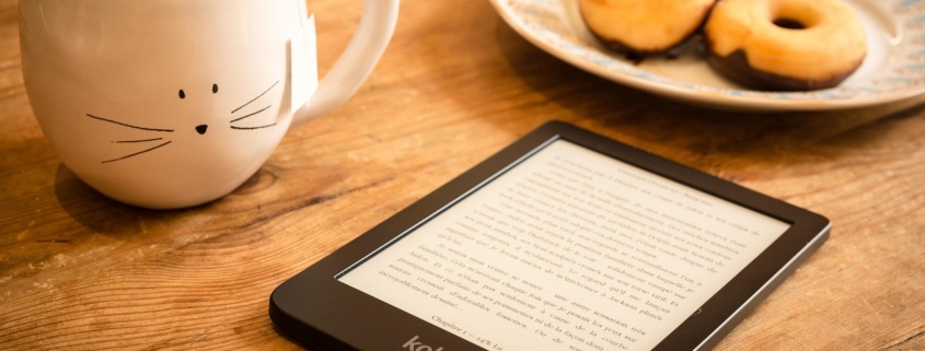 reading, refreshments, e-reader, doughnuts, donuts, dessert, tea, book, e-book, snack, reading, reading, tea, tea, book, book, book, book, book