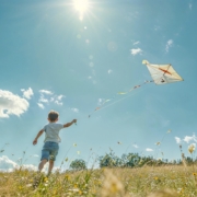 kid, kite, field, darling, sunny, summer, nature, liberty, play, open air, blue, green, fun, childhood, fly, exercise, prairie, happiness, day, light, landscape, clouds, air, movement