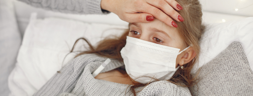 una bambina con i sintomi dell'influenza