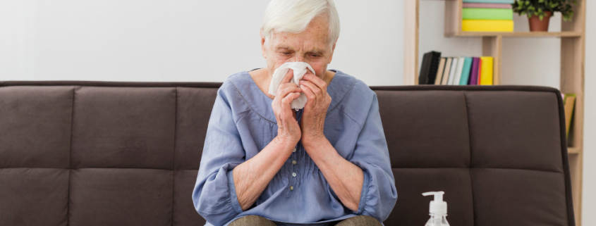 una donna anziana con i sintomi dell'influenza